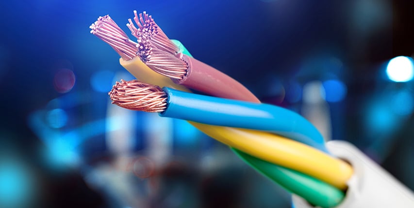 custom cables twisted together close up with burry background