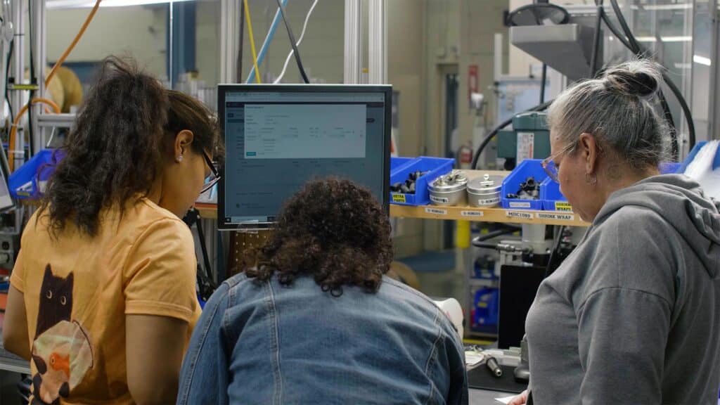 Mercury Wire engineering team collaborating on a custom cable prototype