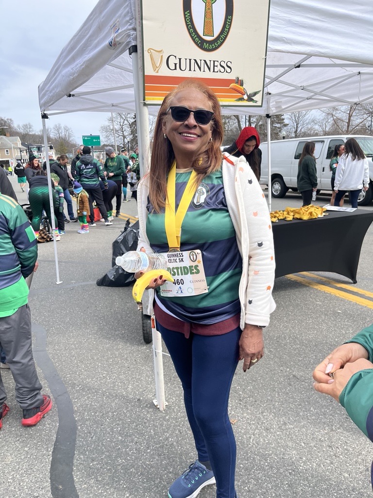 Woman in green attire at event