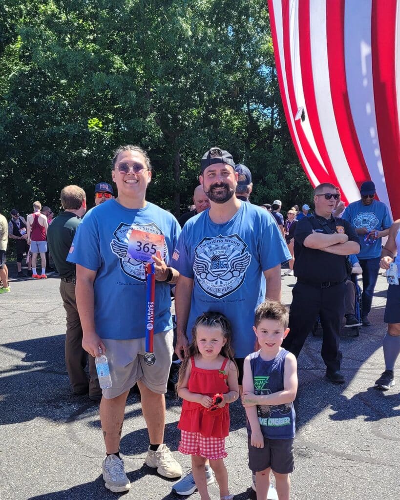 Wire Chasers Return to the Tarentino Strong 5K 1 Two adults and two children smiling