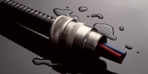 Black hose with metallic connector and water